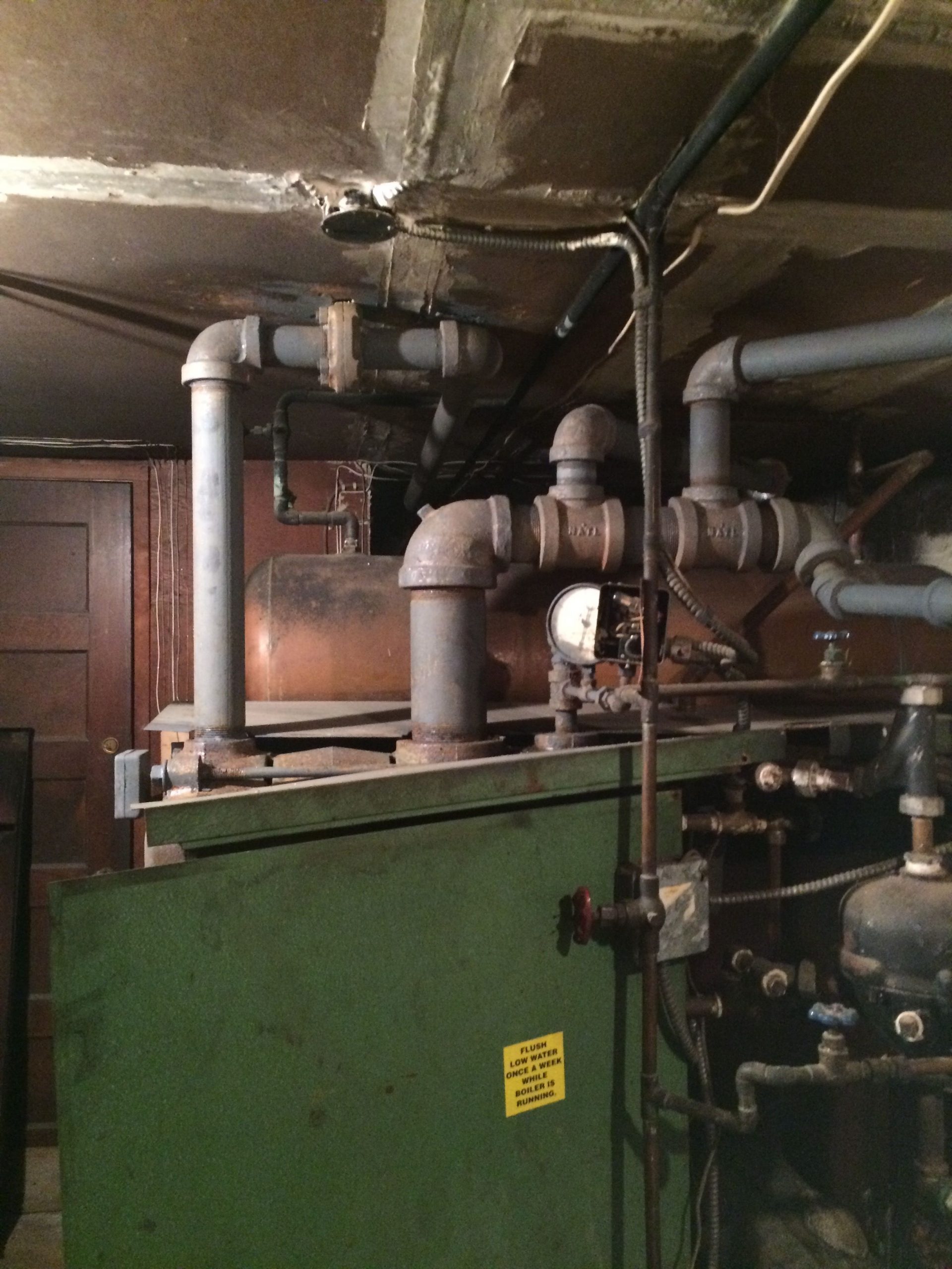 Able Air technician repairing a boiler in Lido Beach, NY