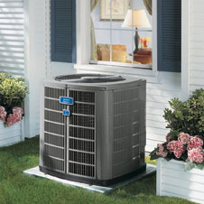 Illustrative residential air-conditioning system beside a Long Island home